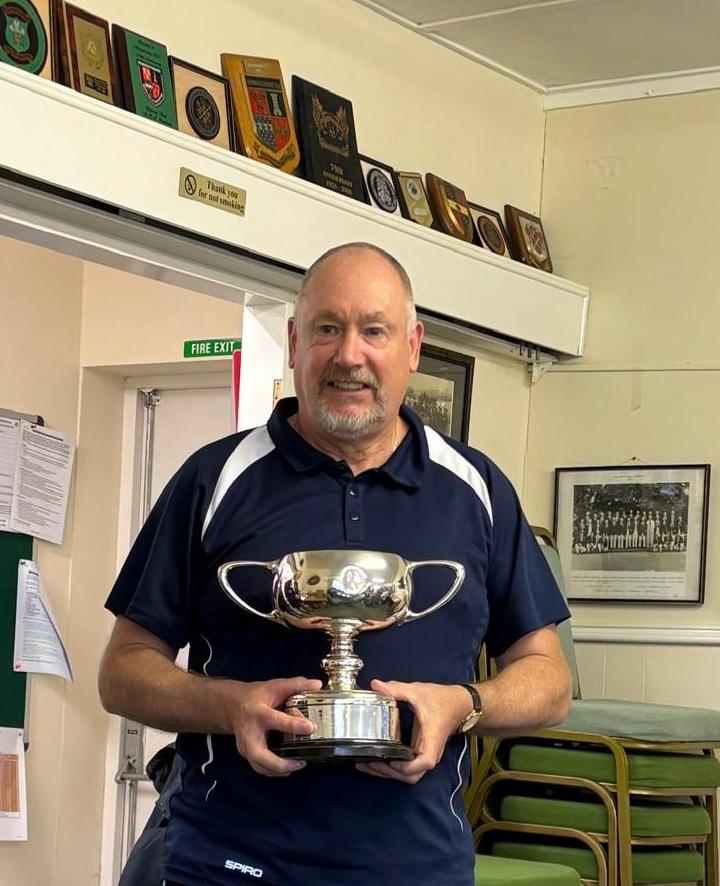 Mark Wells holding the EMBA singles trophy